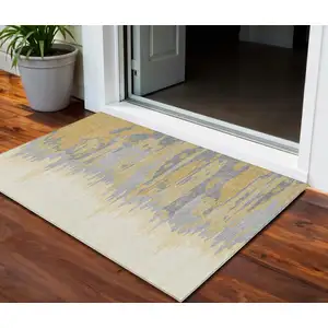 Photo of Gold Gray And Beige Abstract Washable Indoor Outdoor Area Rug