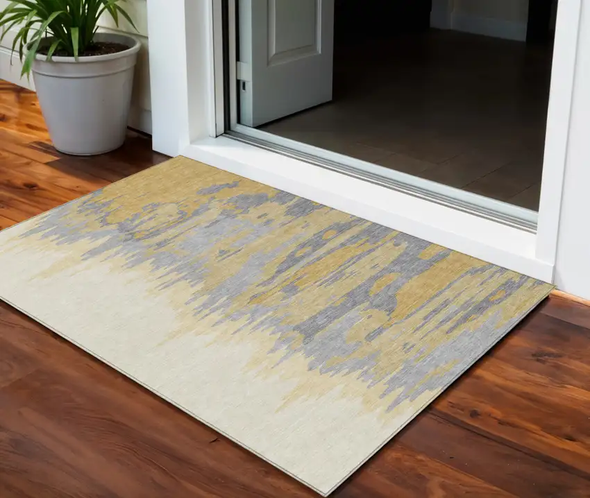 Gold Gray And Beige Abstract Washable Indoor Outdoor Area Rug Photo 1