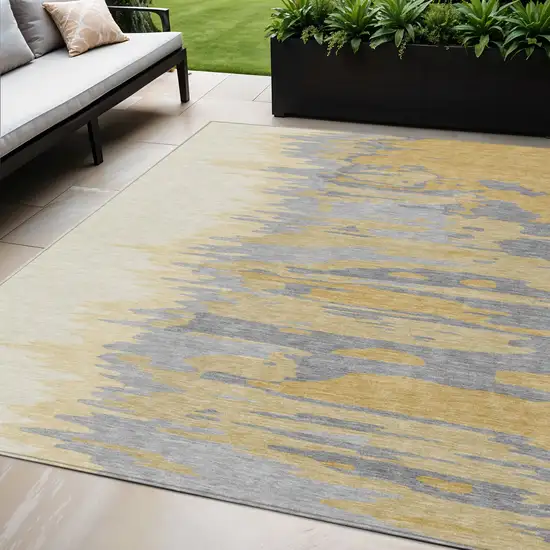 Gold Gray And Beige Abstract Washable Indoor Outdoor Area Rug Photo 1