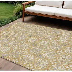 Photo of Gold Gray And Beige Floral Washable Indoor Outdoor Area Rug