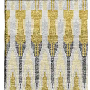 Photo of Gold Gray And Beige Southwestern Washable Area Rug With UV Protection