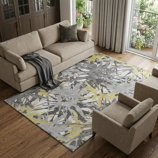Gold Gray And Charcoal Abstract Washable Area Rug With UV Protection Photo 1