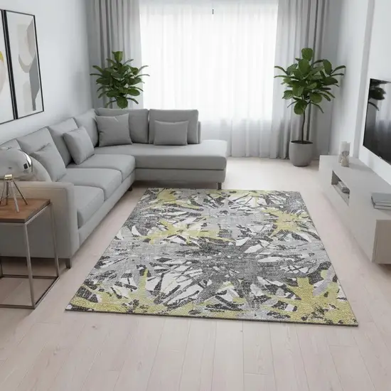 Gold Gray And Charcoal Abstract Washable Area Rug With UV Protection Photo 1