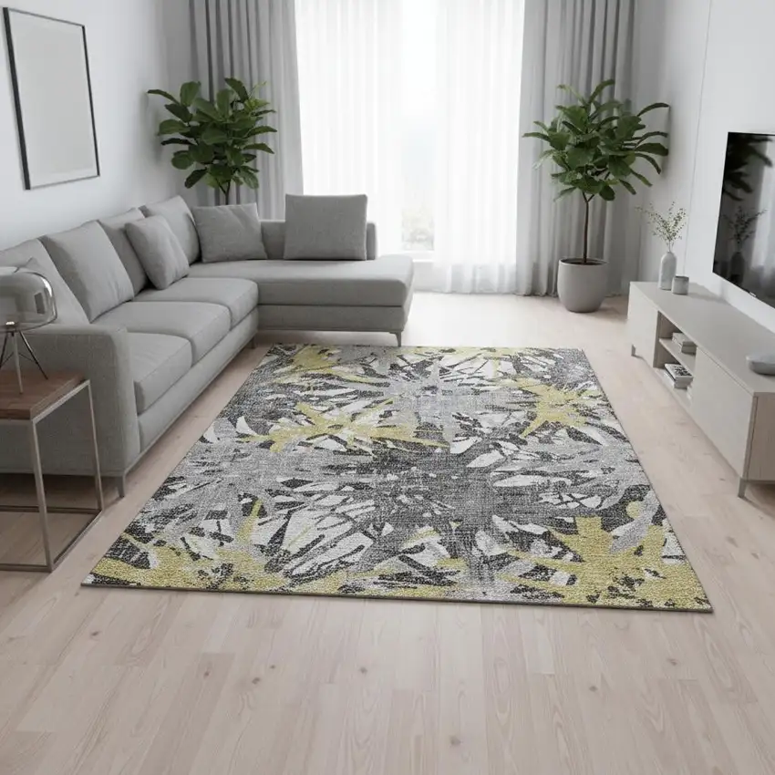 Gold Gray And Charcoal Abstract Washable Area Rug With UV Protection Photo 1