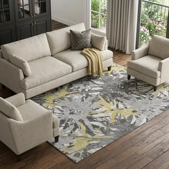 Gold Gray And Charcoal Abstract Washable Area Rug With UV Protection Photo 1