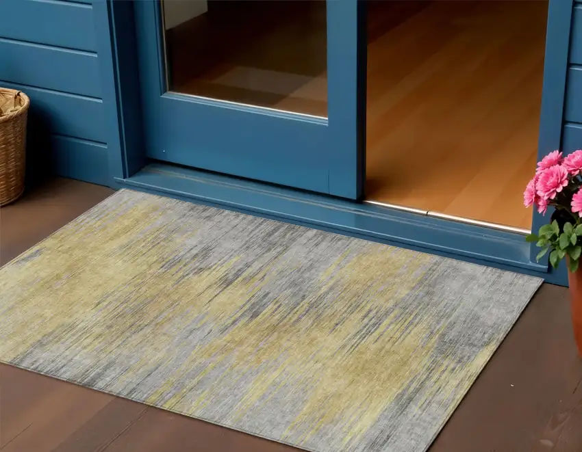 Gold Gray And Charcoal Abstract Washable Indoor Outdoor Area Rug Photo 1