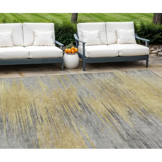 Gold Gray And Charcoal Abstract Washable Indoor Outdoor Area Rug Photo 1