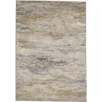 Photo of Gold Gray And Ivory Abstract Area Rug
