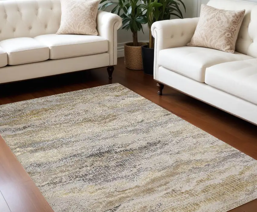 Gold Gray And Ivory Abstract Stain Resistant Area Rug Photo 1