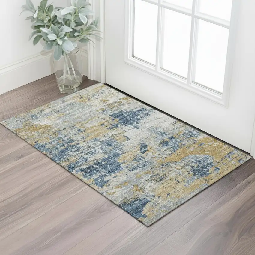 Gold Gray And Ivory Abstract Washable Area Rug With UV Protection Photo 1