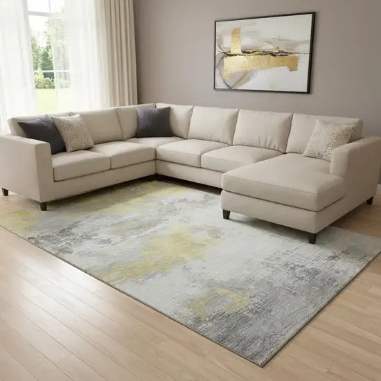 Gold Gray And Ivory Abstract Washable Area Rug With UV Protection Photo 2