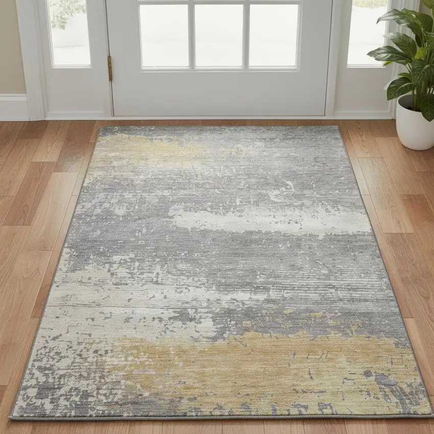 Gold Gray And Ivory Abstract Washable Area Rug With UV Protection Photo 2