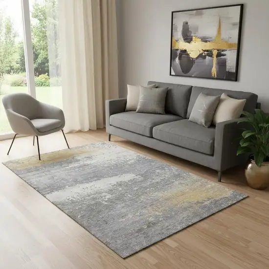 Gold Gray And Ivory Abstract Washable Area Rug With UV Protection Photo 2