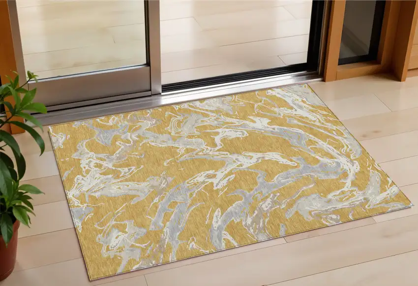 Gold Gray And Ivory Abstract Washable Indoor Outdoor Area Rug Photo 1
