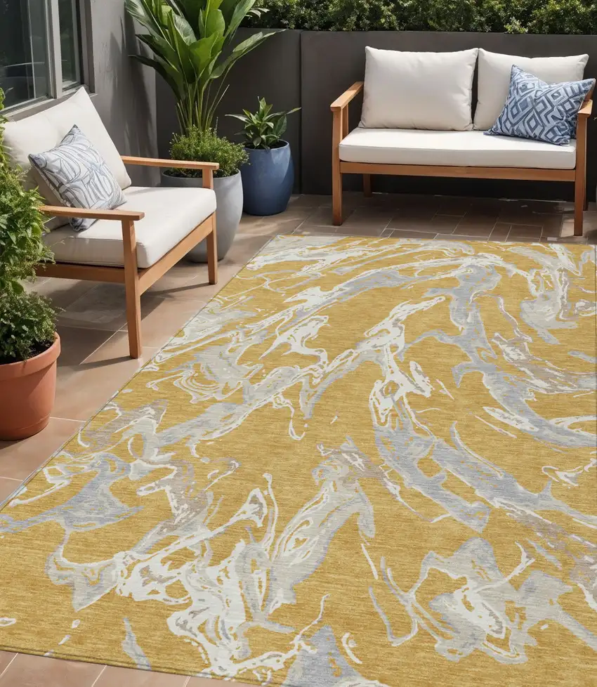 Gold Gray And Ivory Abstract Washable Indoor Outdoor Area Rug Photo 1