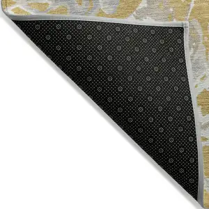 Photo of Gold Gray And Ivory Abstract Washable Indoor Outdoor Area Rug