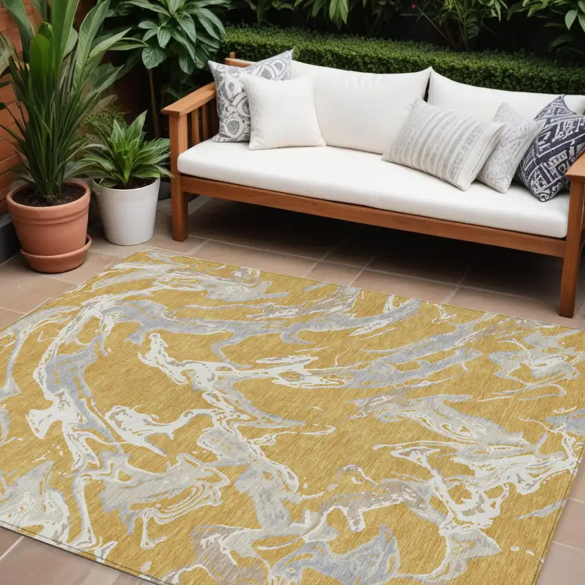 Gold Gray And Ivory Abstract Washable Indoor Outdoor Area Rug Photo 1