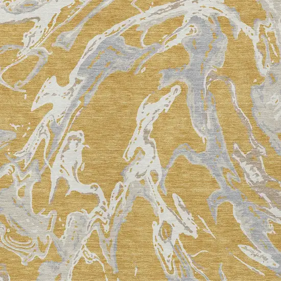Gold Gray And Ivory Abstract Washable Indoor Outdoor Area Rug Photo 7