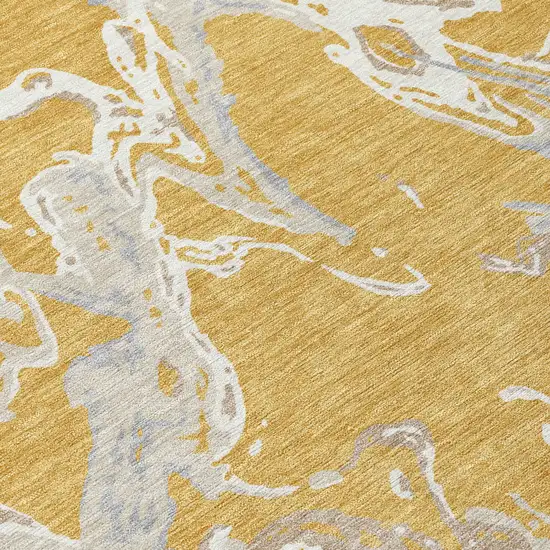 Gold Gray And Ivory Abstract Washable Indoor Outdoor Area Rug Photo 6