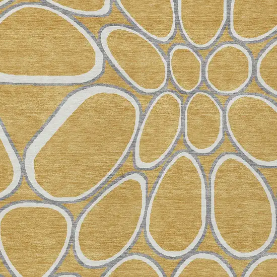 Gold Gray And Ivory Abstract Washable Indoor Outdoor Area Rug Photo 6