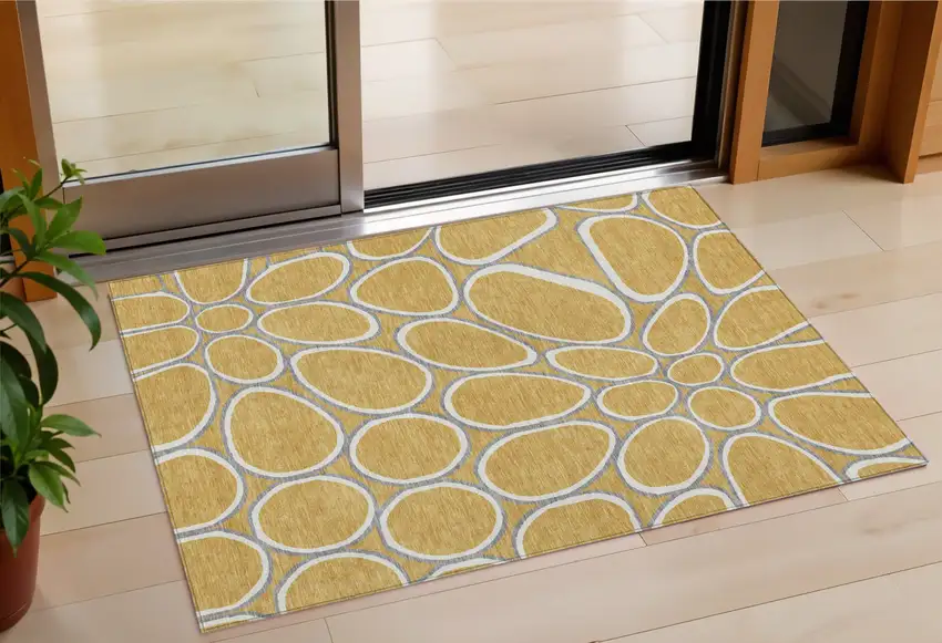 Gold Gray And Ivory Abstract Washable Indoor Outdoor Area Rug Photo 1