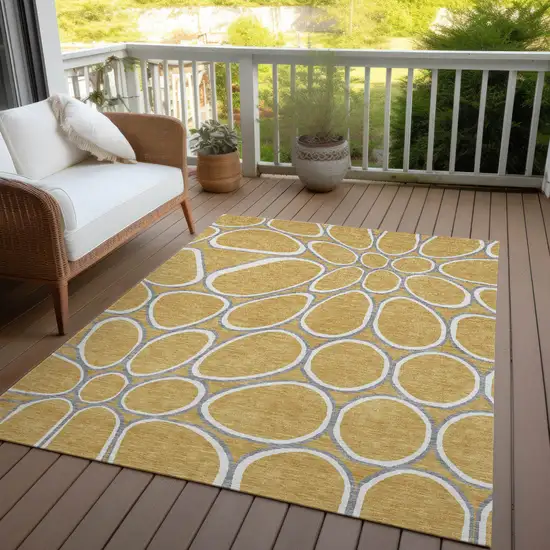 Gold Gray And Ivory Abstract Washable Indoor Outdoor Area Rug Photo 9