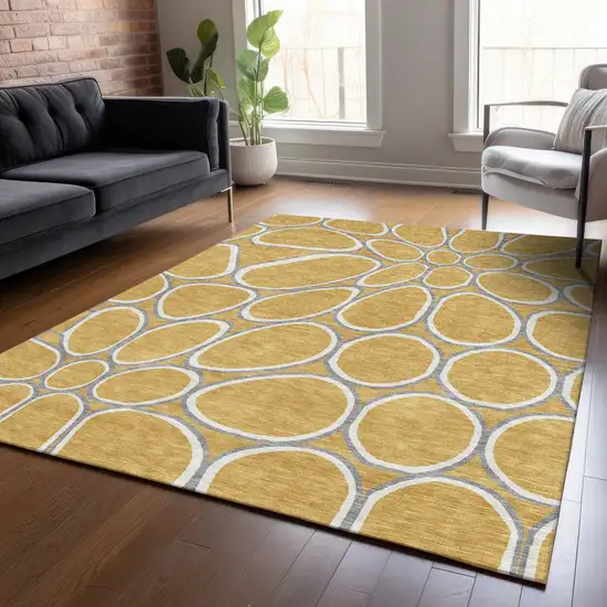 Gold Gray And Ivory Abstract Washable Indoor Outdoor Area Rug Photo 9