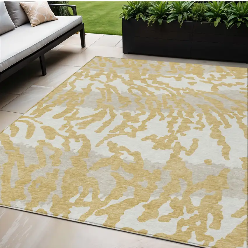 Gold Gray And Ivory Animal Print Washable Indoor Outdoor Area Rug Photo 1