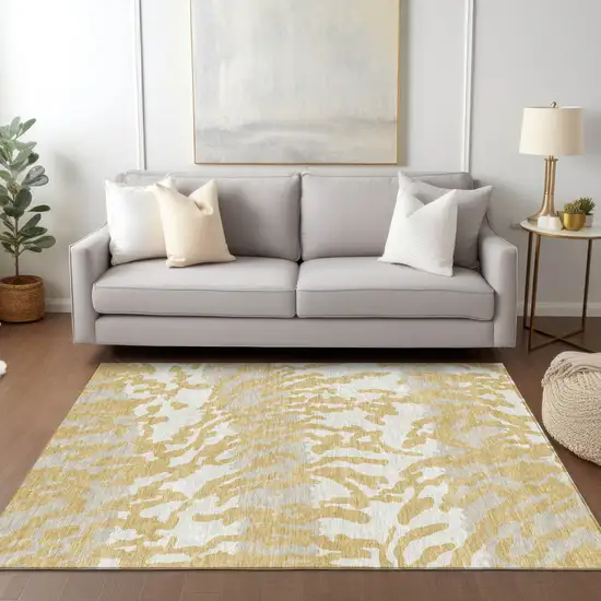 Gold Gray And Ivory Animal Print Washable Indoor Outdoor Area Rug Photo 9