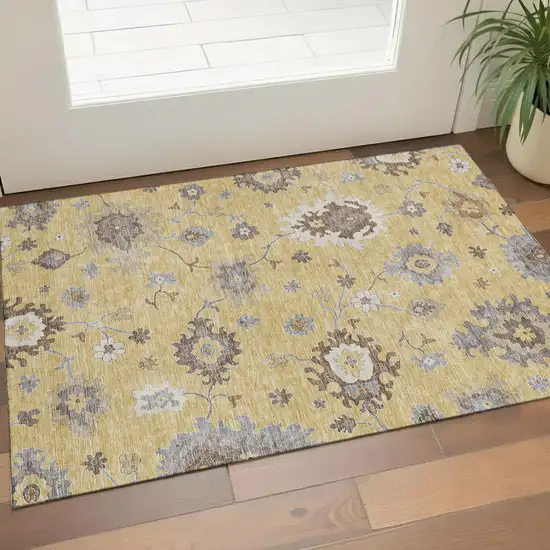 Gold Gray And Ivory Floral Medallion Washable Area Rug With UV Protection Photo 1