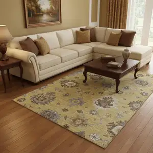 Photo of Gold Gray And Ivory Floral Medallion Washable Area Rug With UV Protection