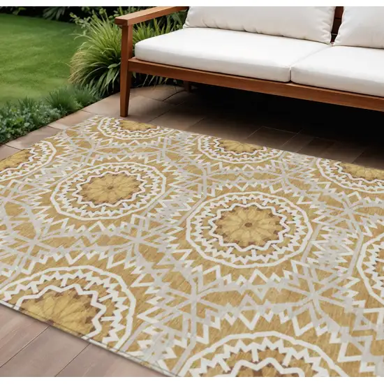 Gold Gray And Ivory Floral Medallion Washable Indoor Outdoor Area Rug Photo 1