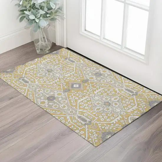 Gold Gray And Ivory Floral Washable Area Rug With UV Protection Photo 1