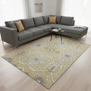 Photo of Gold Gray And Ivory Floral Washable Area Rug With UV Protection