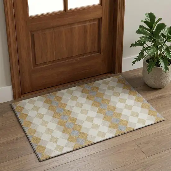 Gold Gray And Ivory Geometric Washable Area Rug With UV Protection Photo 1
