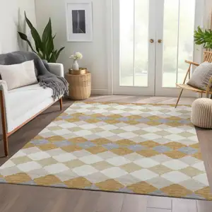 Photo of Gold Gray And Ivory Geometric Washable Area Rug With UV Protection