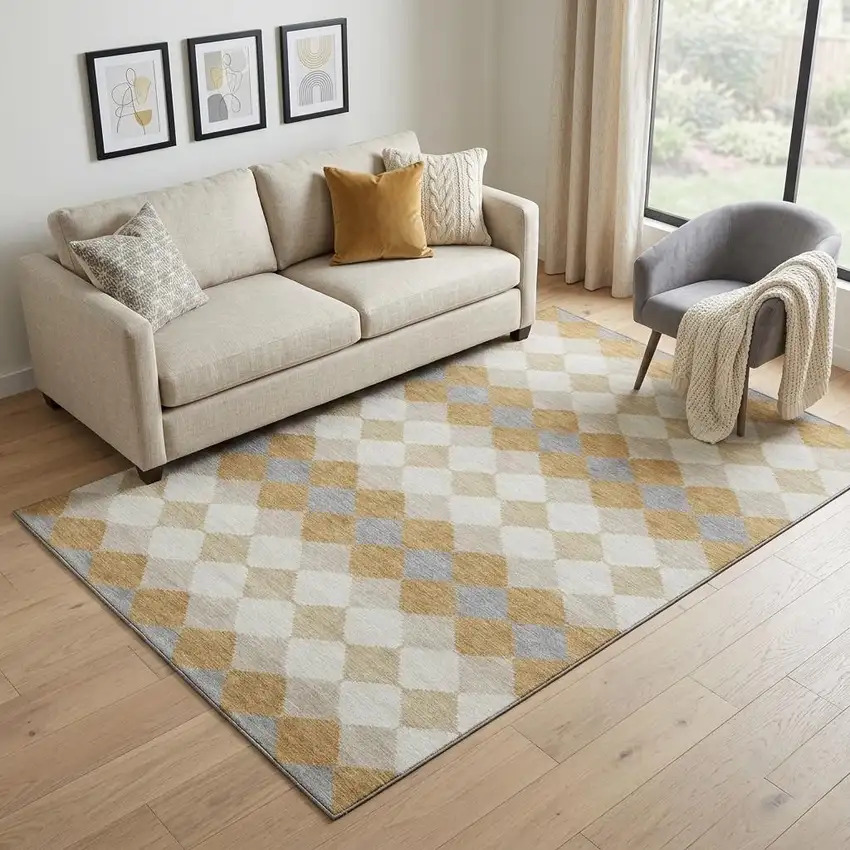 Gold Gray And Ivory Geometric Washable Area Rug With UV Protection Photo 1