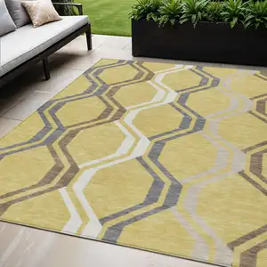 Photo of Gold Gray And Ivory Geometric Washable Indoor Outdoor Area Rug