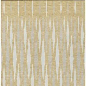 Photo of Gold Gray And Ivory Geometric Washable Indoor Outdoor Area Rug