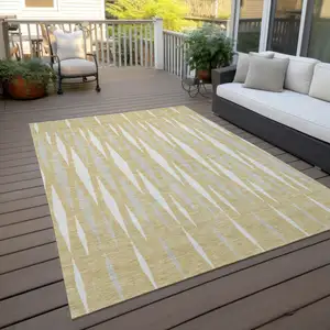 Photo of Gold Gray And Ivory Geometric Washable Indoor Outdoor Area Rug