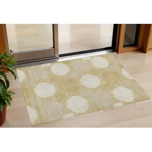 Photo of Gold Gray And Ivory Geometric Washable Indoor Outdoor Area Rug