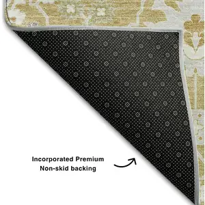 Photo of Gold Gray And Ivory Oriental Washable Area Rug With UV Protection