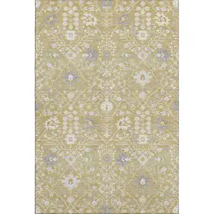 Photo of Gold Gray And Ivory Oriental Washable Area Rug With UV Protection