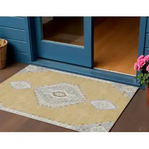 Photo of Gold Gray And Ivory Oriental Washable Indoor Outdoor Area Rug