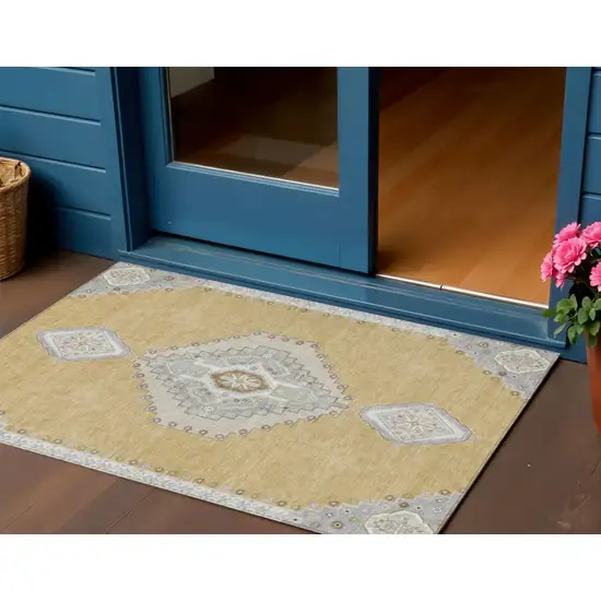 Gold Gray And Ivory Oriental Washable Indoor Outdoor Area Rug Photo 1