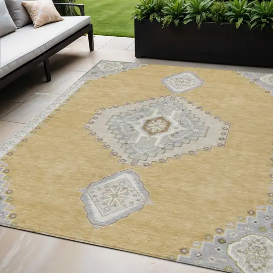 Gold Gray And Ivory Oriental Washable Indoor Outdoor Area Rug Photo 1