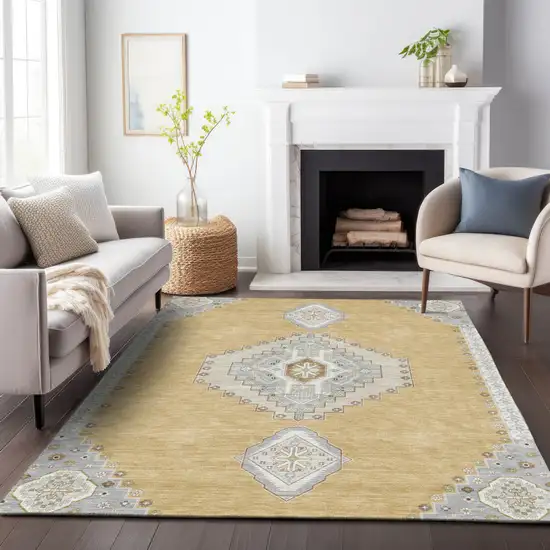 Gold Gray And Ivory Oriental Washable Indoor Outdoor Area Rug Photo 9