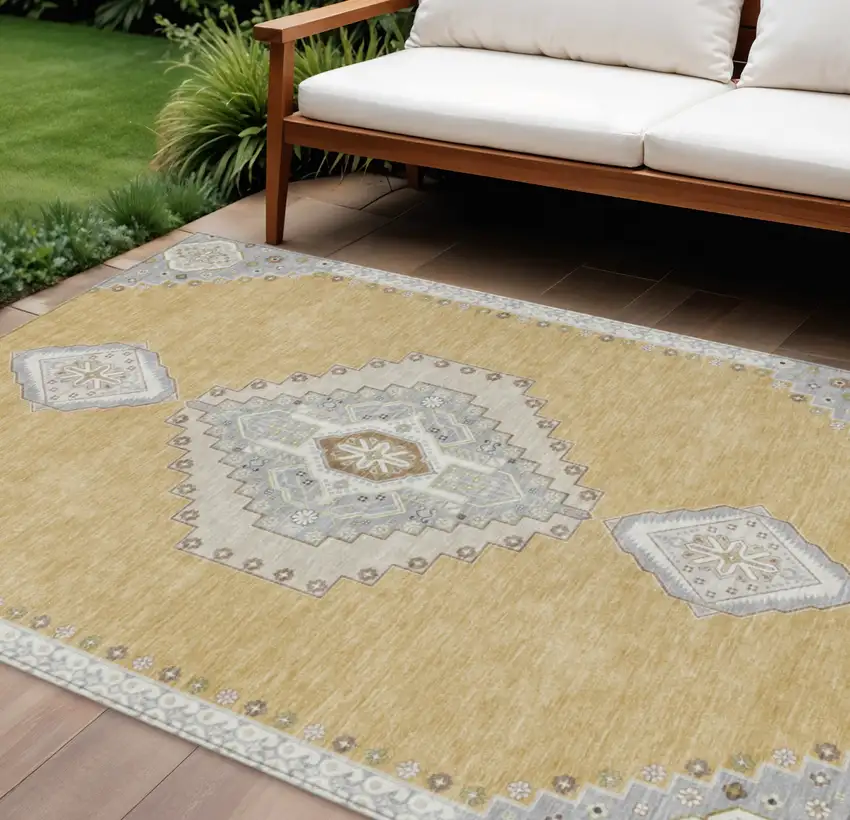 Gold Gray And Ivory Oriental Washable Indoor Outdoor Area Rug Photo 1