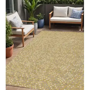 Photo of Gold Gray And Ivory Polka Dot Washable Indoor Outdoor Area Rug