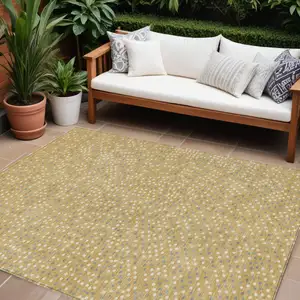 Photo of Gold Gray And Ivory Polka Dot Washable Indoor Outdoor Area Rug